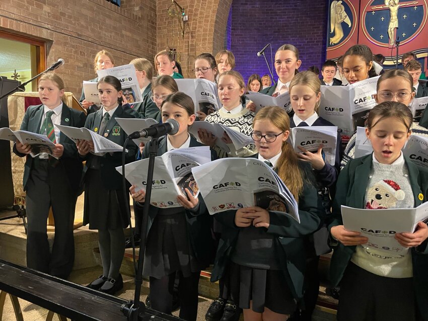 Image of SEA Choir sing for CAFOD